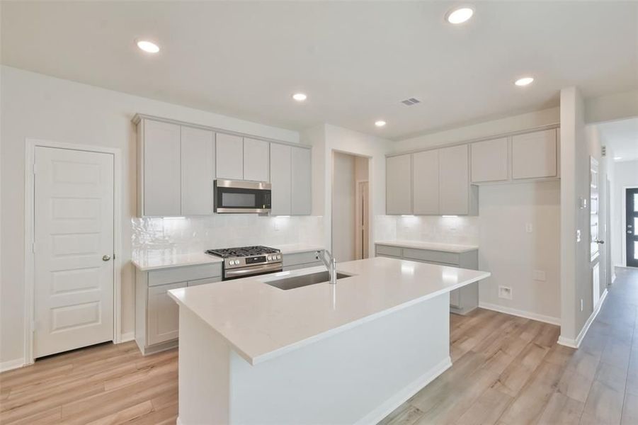 Furnished interior view inside a new home in Lakes at Black Oak, Magnolia (Image 34).