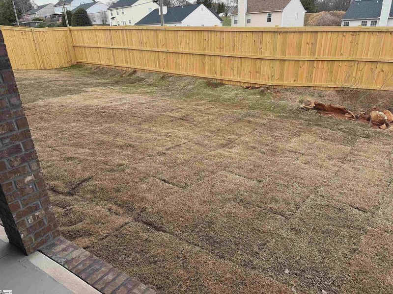 Exterior details and patio area of a home in Hidden Lake Estates, Greenville (Image 3).