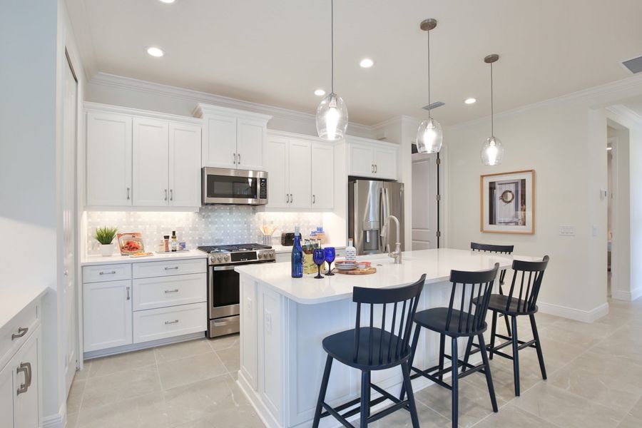 Representative furnished interior of a home built from the Sandcastle 2 by Neal Communities in Boca Royale Golf & Country Club at Wellen Park, Englewood (Image 8).