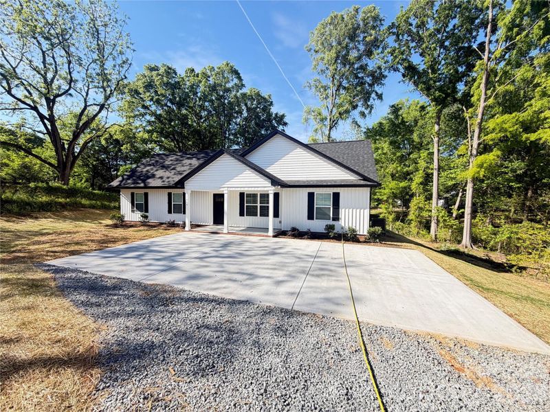 Front exterior of a new home in , Kannapolis, NC, highlighting curb appeal (Image 1). Front exterior of a new home in , Kannapolis, NC, highlighting curb appeal (Image 1).