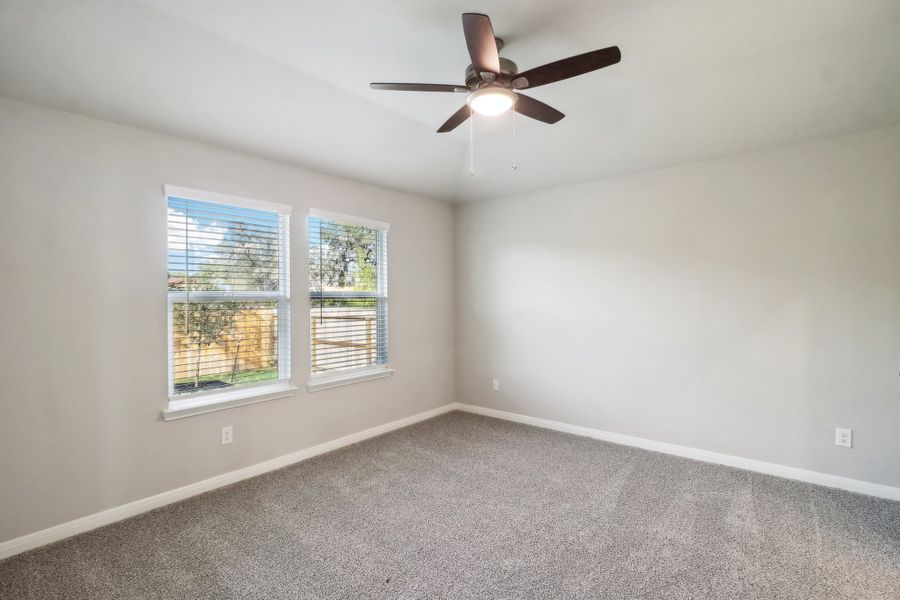 Primary suite in the Cascade floorplan at a Meritage Homes community.