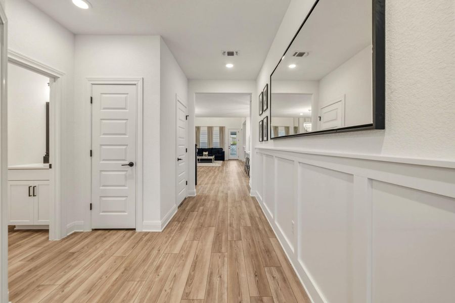 Entry featuring board and batten wall paneling