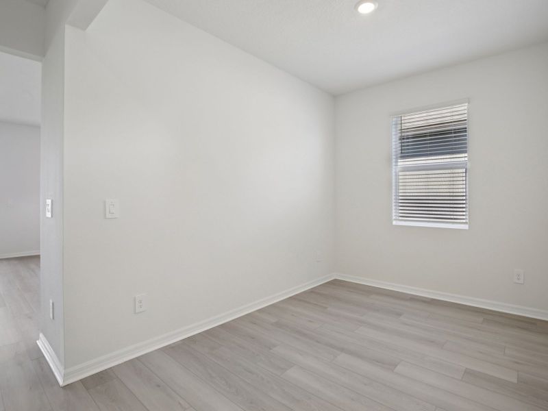 Spacious, unfurnished interior of a new home in Coasterra - Reserve Series, Palmetto (Image 12).