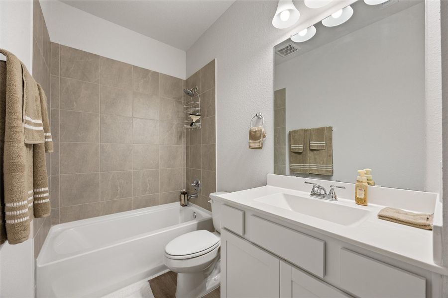 Furnished interior view inside a new home in Mill Creek Trails, Magnolia (Image 4).