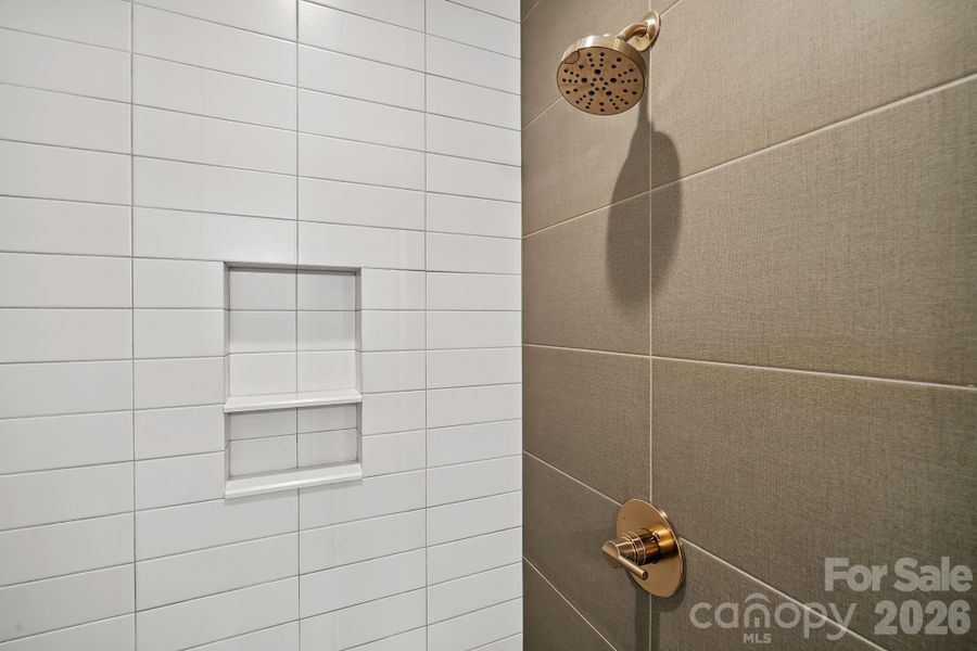 Custom Tiled Shower in the Primary Suite Custom Tiled Shower in the Primary Suite