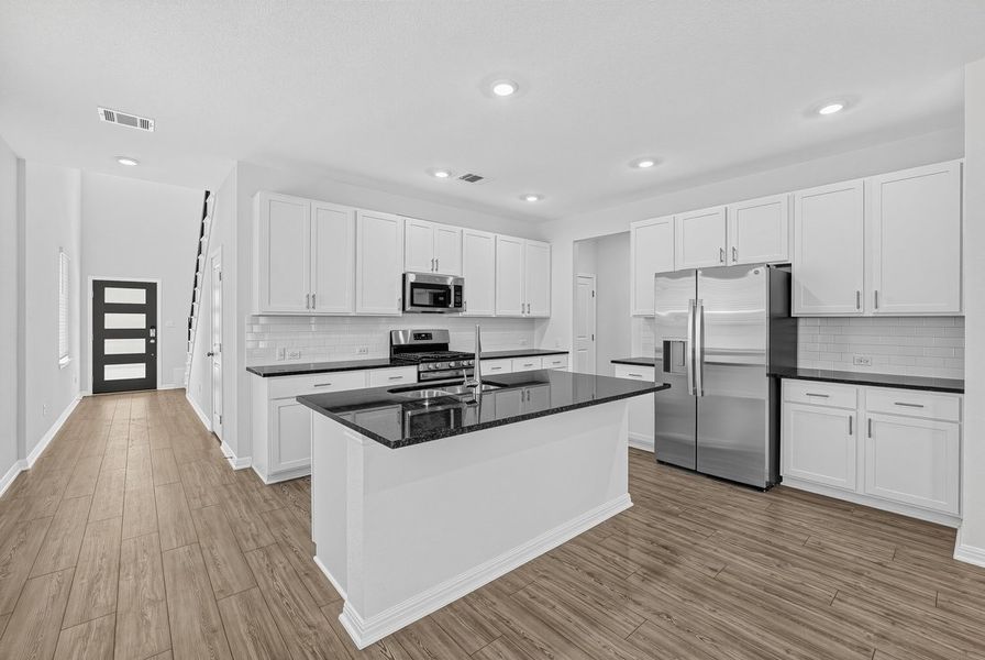 Furnished interior view inside a new home in Sunfield, Buda (Image 18).