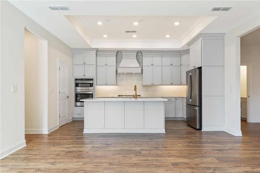 Furnished interior view inside a new home in The Courtyards of Franklin Goldmine, Cumming (Image 6).