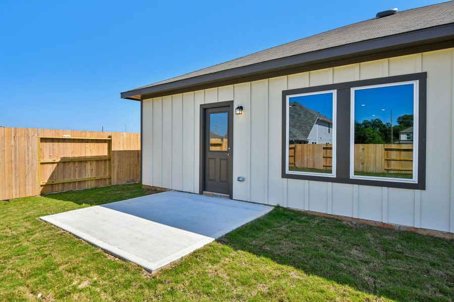 The backyard is designed for family living and outdoor enjoyment.