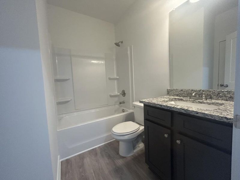 Furnished interior view inside a new home in Sutton's Landing, Statham (Image 3).