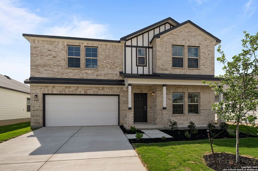 Front exterior of a new home in Paloma Park, Converse, TX, highlighting curb appeal (Image 13). Front exterior of a new home in Paloma Park, Converse, TX, highlighting curb appeal (Image 13).