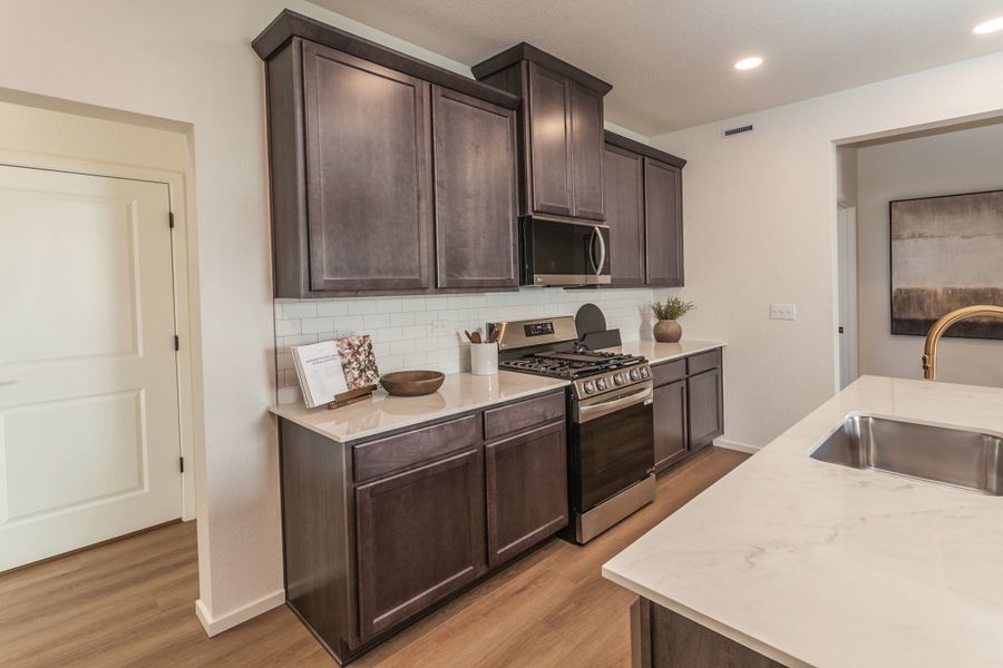 Representative furnished interior of a home built from the Armstrong by Hartford Homes in Bloom, Fort Collins (Image 16).