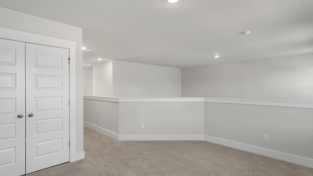 Spacious, unfurnished interior of a new home in The Palms at Indigo Preserve Townhomes, Leland (Image 32). Spacious, unfurnished interior of a new home in The Palms at Indigo Preserve Townhomes, Leland (Image 32).