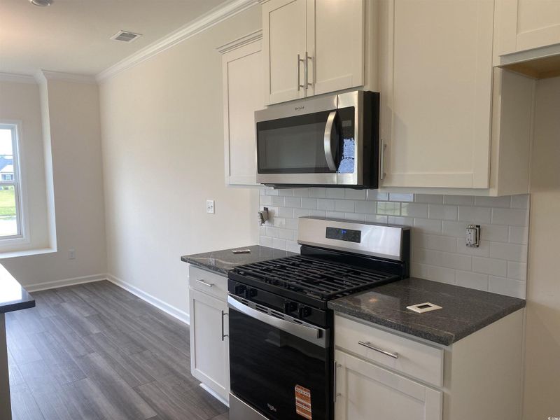 Furnished interior view inside a new home in Oak Hollow, Longs (Image 9).