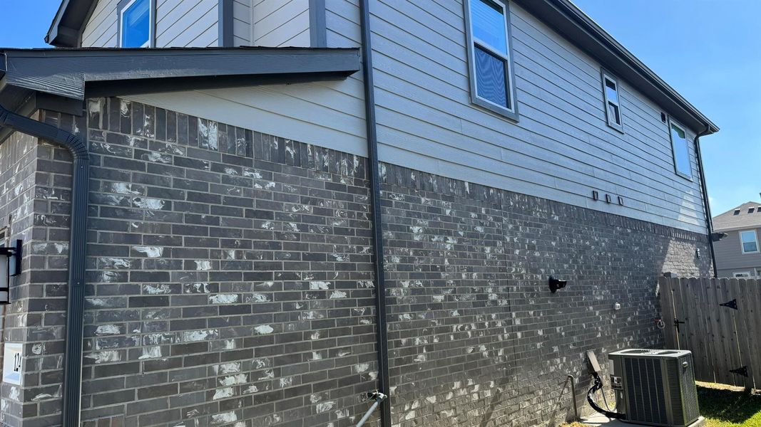 Exterior details and patio area of a home in , Houston (Image 3).