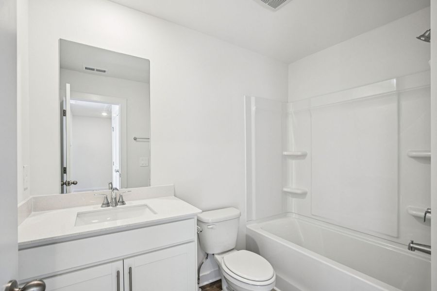 Furnished interior view inside a new home in Greystone - Highland Townhomes, Smyrna (Image 9).