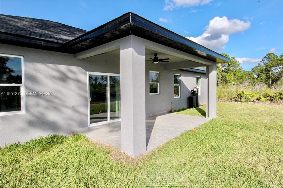 Exterior details and patio area of a home in , Sebring (Image 3).