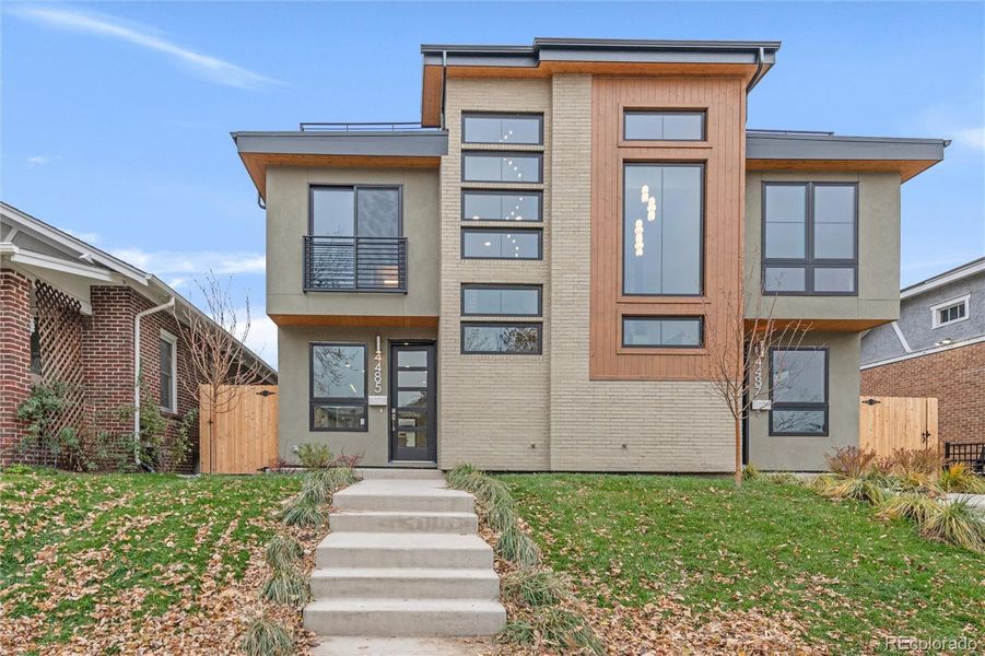 4485 Utica is brand-new construction, elevated slightly above the street level.