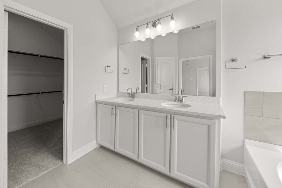 Representative furnished interior of a home built from the Addison II by Pacesetter Homes in Leonard Trails, Anna (Image 11).