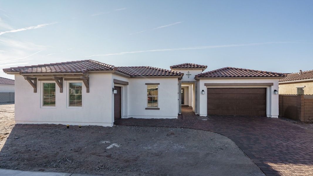 Exterior details and patio area of a home in Harmony at Montecito in Estrella, Goodyear (Image 2). Exterior details and patio area of a home in Harmony at Montecito in Estrella, Goodyear (Image 2).