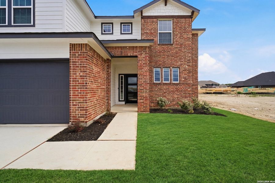 Exterior details and patio area of a home in Megan's Landing, Castroville (Image 3).