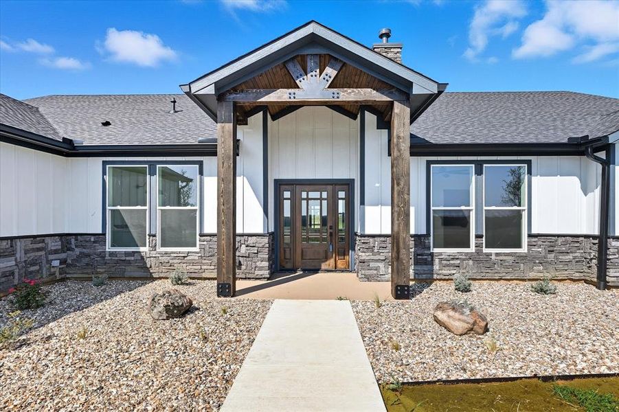 Front exterior of a new home in , Whitesboro, TX, highlighting curb appeal (Image 2). Front exterior of a new home in , Whitesboro, TX, highlighting curb appeal (Image 2).