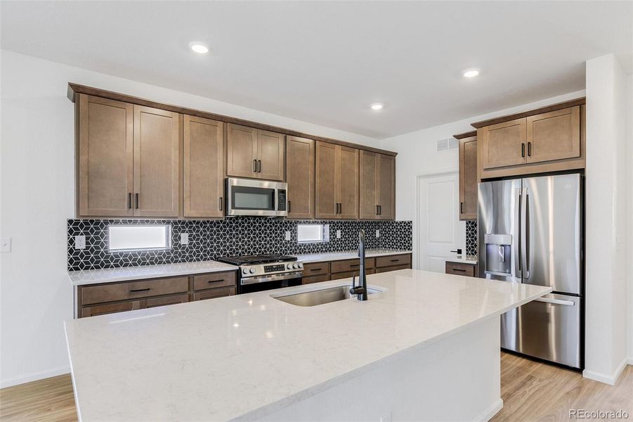Furnished interior view inside a new home in Terrain Oak Valley, Castle Rock (Image 6).