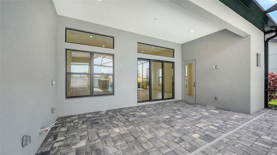 Exterior details and patio area of a home in , Nokomis (Image 30).
