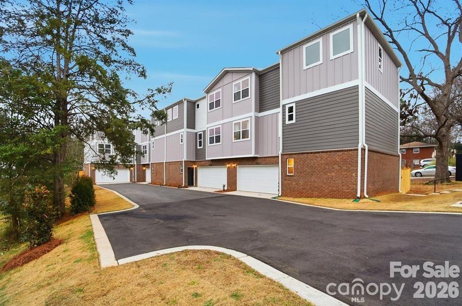 Front exterior of a new home in , Charlotte, NC, highlighting curb appeal (Image 1). Front exterior of a new home in , Charlotte, NC, highlighting curb appeal (Image 1).