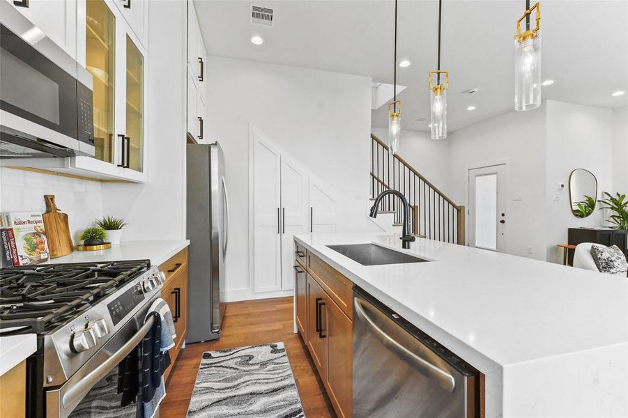 the kitchen features gas stove top the kitchen features gas stove top