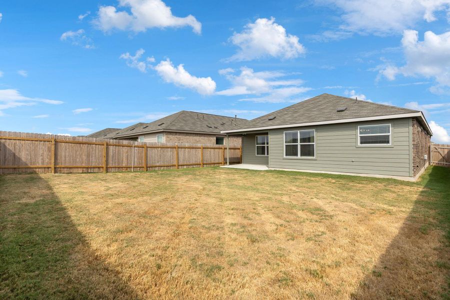 Exterior details and patio area of a home in Cotton Brook: Claremont Collection, Hutto (Image 1). Exterior details and patio area of a home in Cotton Brook: Claremont Collection, Hutto (Image 1).