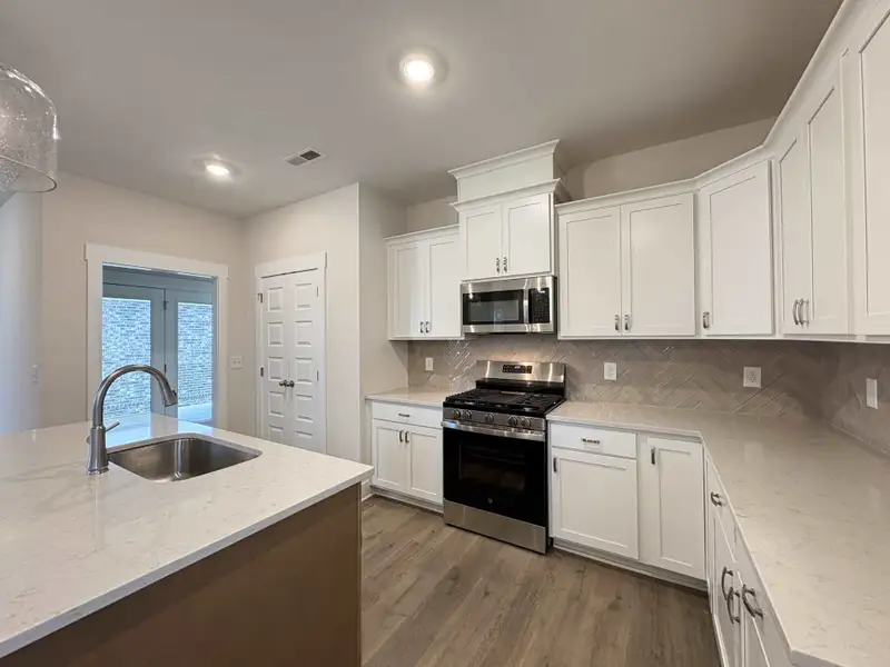 Furnished interior view inside a new home in The Paddock, Gallatin (Image 3).