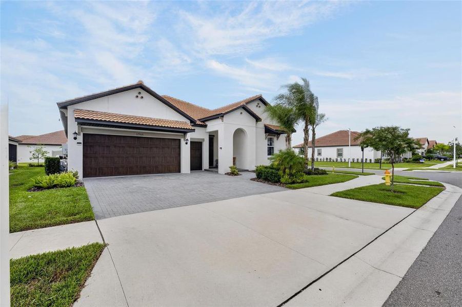 Front exterior of a new home in Southshore Bay Active Adult, Wimauma, FL, highlighting curb appeal (Image 29).