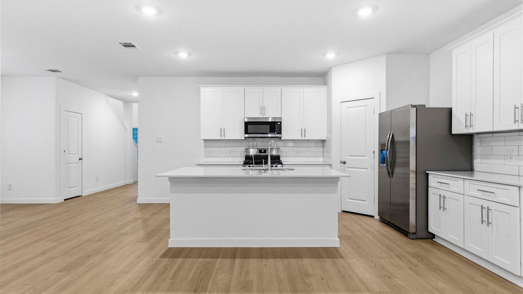 Furnished interior view inside a new home in Lakes at Westland Ranch, League City (Image 5).
