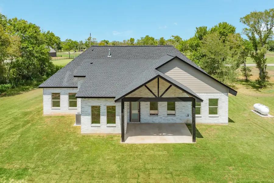 Exterior details and patio area of a home in , Richwood (Image 4).