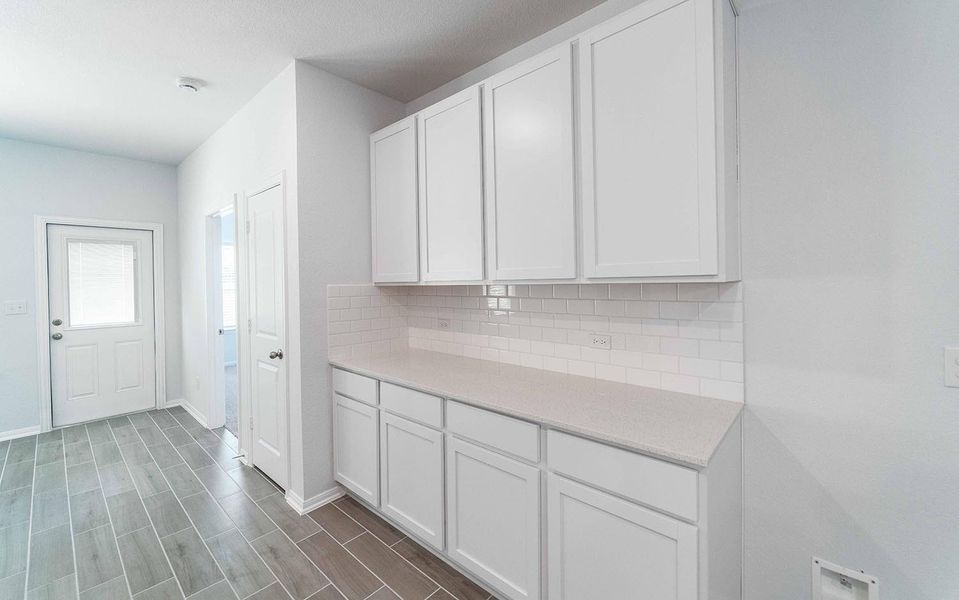 Furnished interior view inside a new home in Caney Mills, Conroe (Image 5).