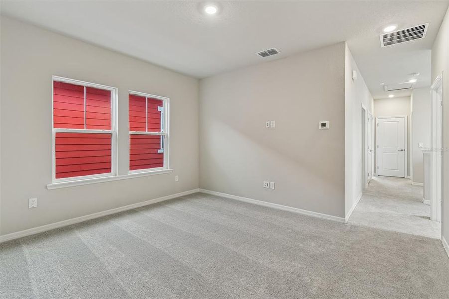 Spacious, unfurnished interior of a new home in Laureate Park at Lake Nona - Garden Series, Orlando (Image 36).