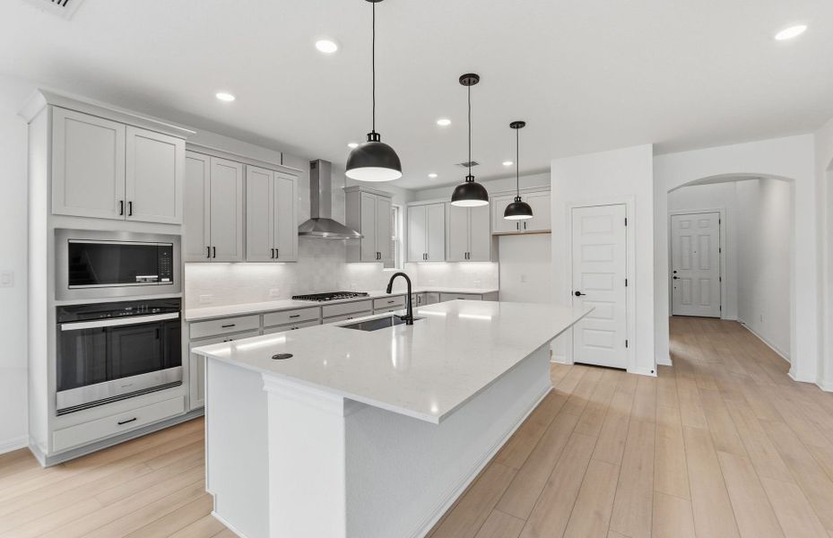 Furnished interior view inside a new home in West Cypress Hills, Spicewood (Image 10).