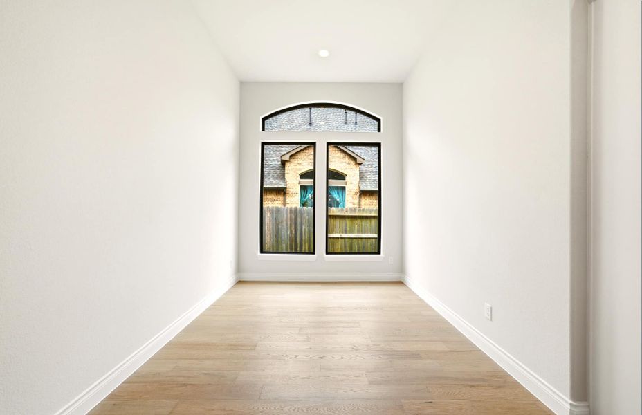 Spacious, unfurnished interior of a new home in The Woodlands Hills 65′, Willis (Image 23).