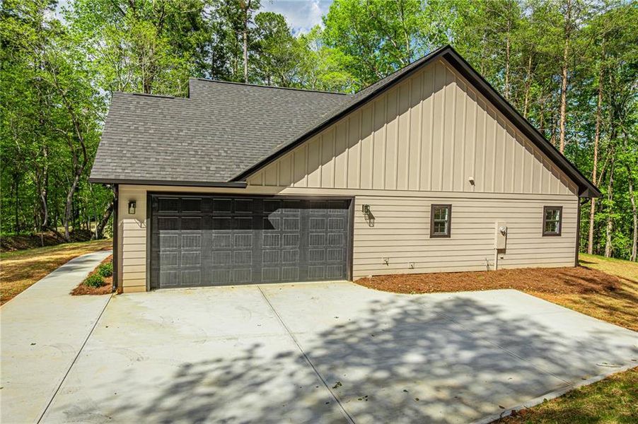 Front exterior of a new home in , Dawsonville, GA, highlighting curb appeal (Image 30).