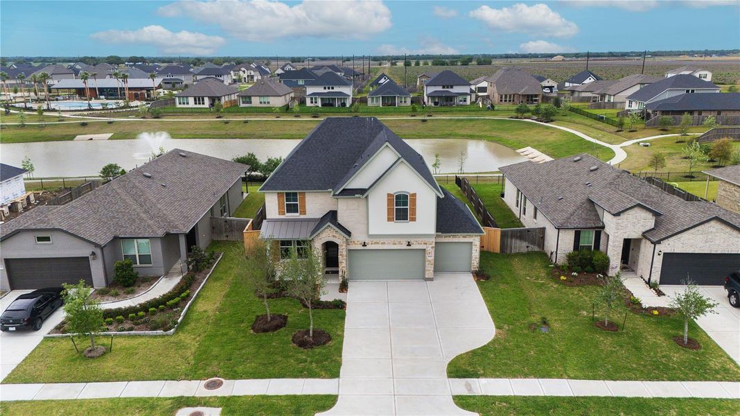 Front exterior of a new home in , Richmond, TX, highlighting curb appeal (Image 25). Front exterior of a new home in , Richmond, TX, highlighting curb appeal (Image 25).