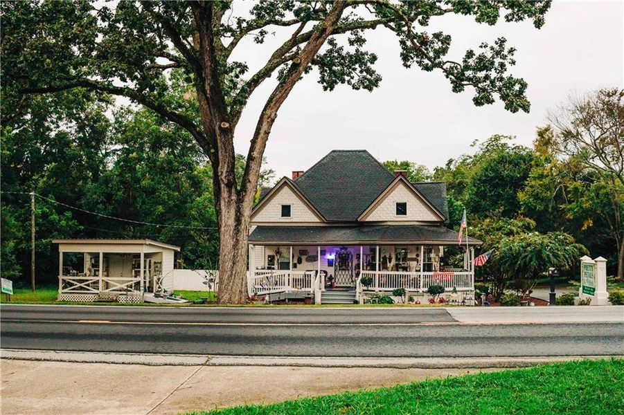 Front exterior of a new home in Rosewood Lake Estates, Hoschton, GA, highlighting curb appeal (Image 51).