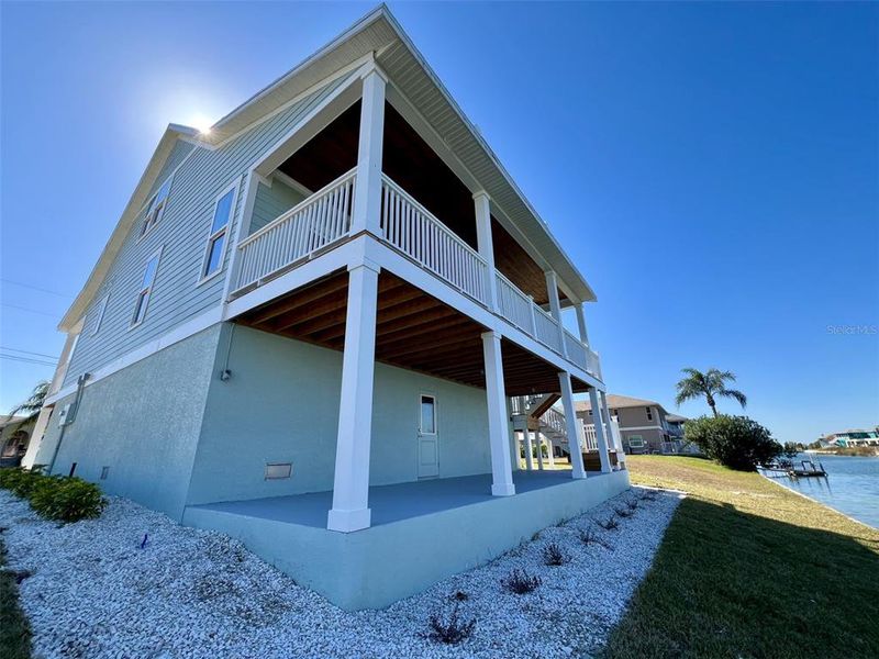 Exterior details and patio area of a home in , Hernando Beach (Image 24).