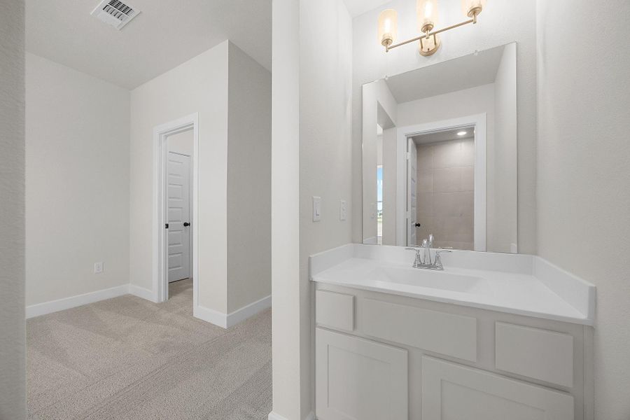 Furnished interior view inside a new home in Lariat, Liberty Hill (Image 15). Furnished interior view inside a new home in Lariat, Liberty Hill (Image 15).
