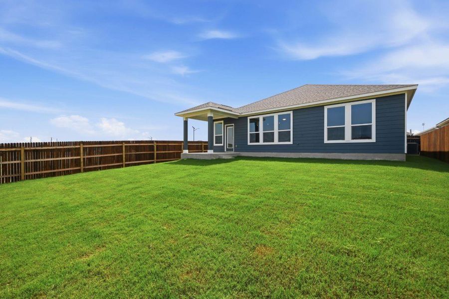 Exterior details and patio area of a home in Watermill-Classic Collection, Uhland (Image 18).