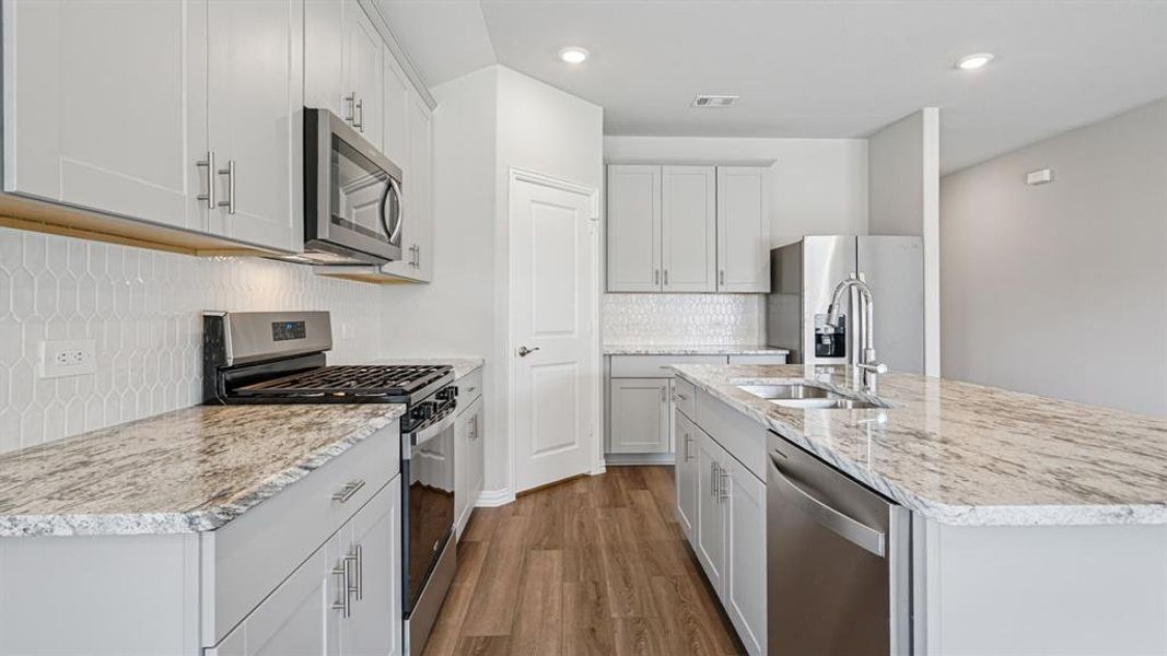 Photo is not of the actual home, but is an inspirational photo of builder’s model home and may depict options, furnishings, and/or decorator features that are not included.