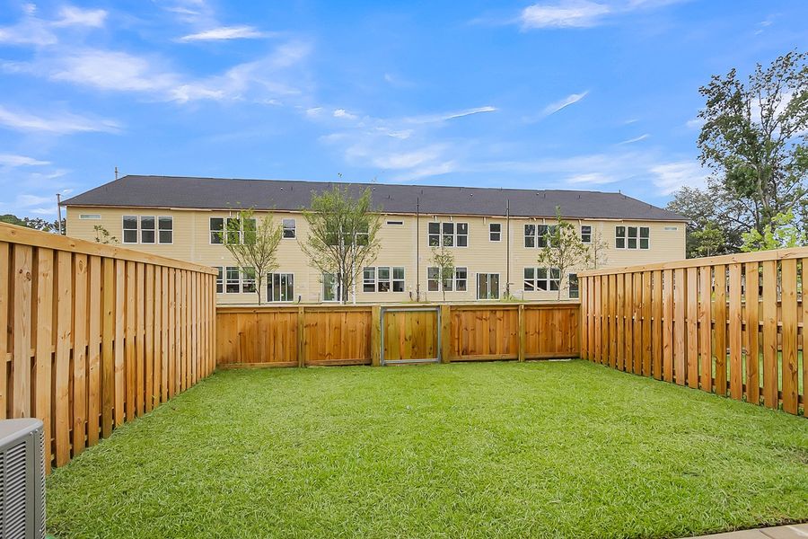 Exterior details and patio area of a home in Pineland Preserve, Summerville (Image 4).