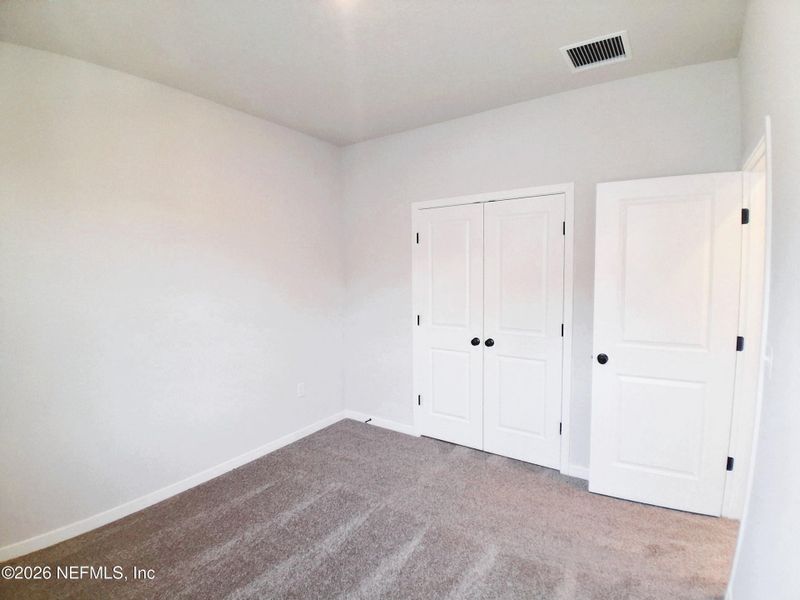 Spacious, unfurnished interior of a new home in Seminole Palms, Palm Coast (Image 20).