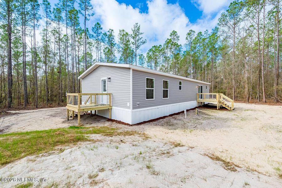 Exterior details and patio area of a home in , Lake Butler (Image 21).