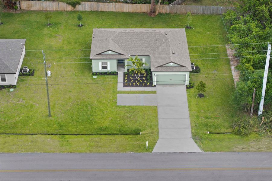 Front exterior of a new home in , Port St. Lucie, FL, highlighting curb appeal (Image 2). Front exterior of a new home in , Port St. Lucie, FL, highlighting curb appeal (Image 2).