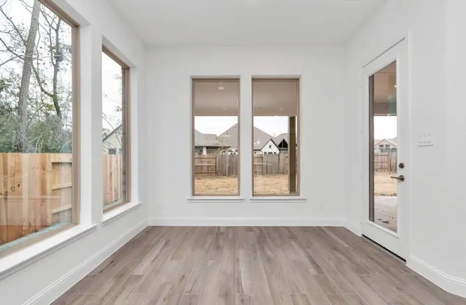 Spacious, unfurnished interior of a new home in Amira: Hilltop Collection, Tomball (Image 11).